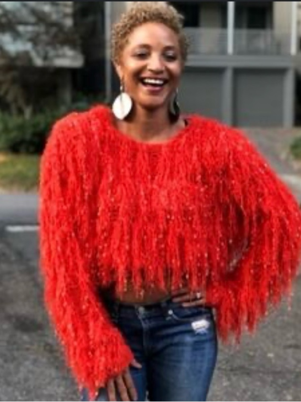 Reddish Shaggy fringed pullover sweater.